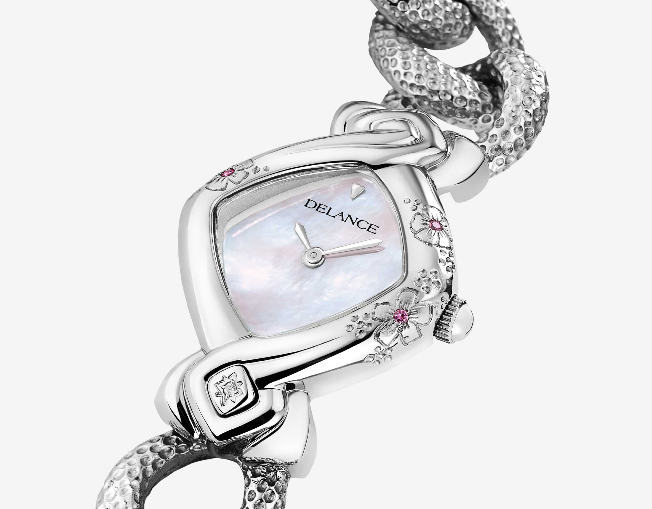 Elegante originelle Damen Uhr: Kanon acier: Stahlduhr mit 3 Blumen und 3 rosa Saphiren , Zifferblatt Perlmutter weiss, Stahlcabochon mit einem Diamanten, Armband aus Silber