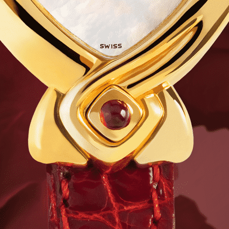 Damenuhren Eleganz für Frauen: Au cœur de la rose: Golduhr mit 17 Diamanten, Zifferblatt Perlmutt weiss, vergoldete Zeiger, Goldcabochon mit Rubin, Armband aus Alligatorleder rot