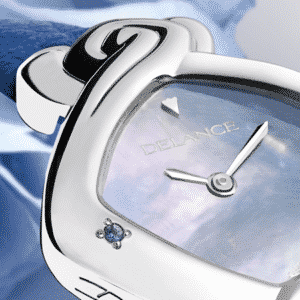 best watches for mom - Kate: Steel watch, blue mother-of-pearl dial, nickel-plated hands, steel cabochon with a sapphire, blue leather strap, set with two sapphires for George and Charlotte