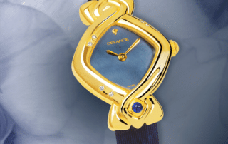 best watches for mom - May: Gold watch set with 6 diamonds, blue mother-of pearl dial, gold-plated hands, gold cabochon with a sapphire, azur sateen strap