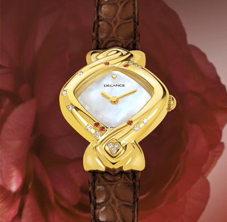 My Mother's Watch : Montre en or sertie de 12 diamants et 5 rubis, cadran nacre blanche, aiguilles dorées, cabochon avec 3 diamants en forme de cœur, bracelet en alligator rouge vin