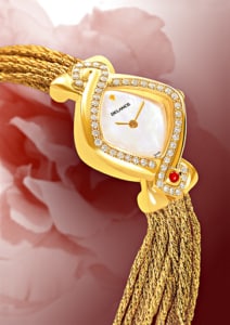 Besten Luxusuhren für die Frau: Infinity Gold cascade: Golduhr mit 50 Diamanten, Zifferblatt Perlmutter weiss, vergoldete Hände, Goldcabochon mit einem Rubin, Goldarmband Cascade
